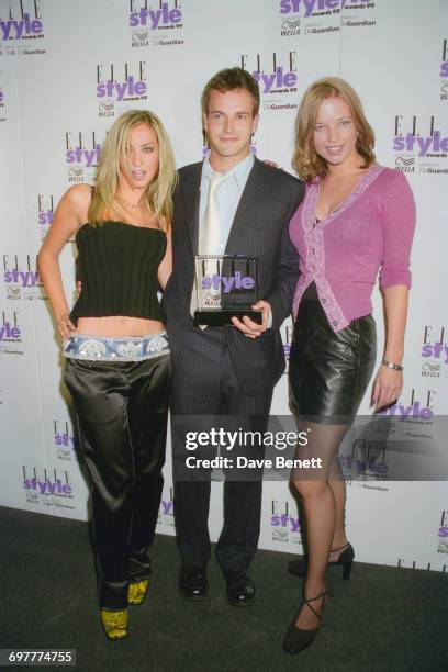 Actor Jonny Lee Miller with his girlfriend Natalie Appleton of girl group All Saints and television presenter Sara Cox at the Elle Magazine Style...