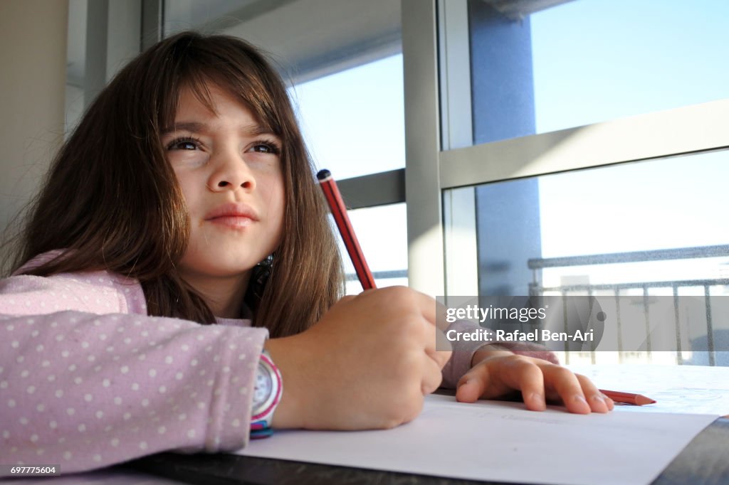 Young girl thinking inspiration