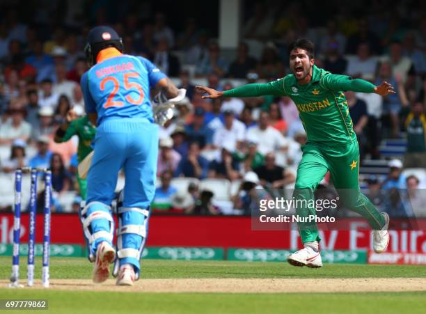 Muhammad Amir of Pakistan celebrate the wicket of Shikhar Dhawan of India during the ICC Champions Trophy Final match between India and Pakistan at...
