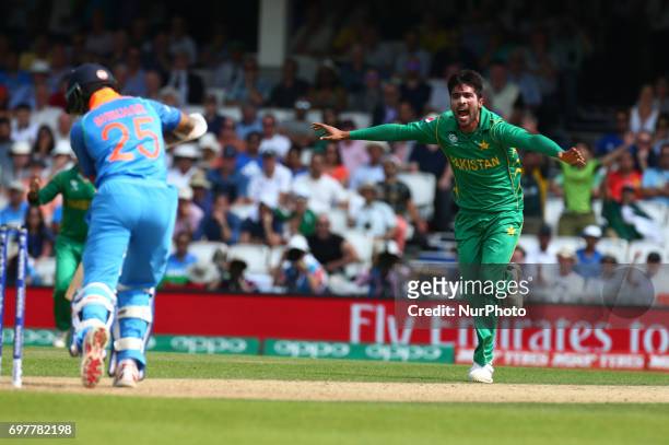Muhammad Amir of Pakistan celebrate the wicket of Shikhar Dhawan of India during the ICC Champions Trophy Final match between India and Pakistan at...