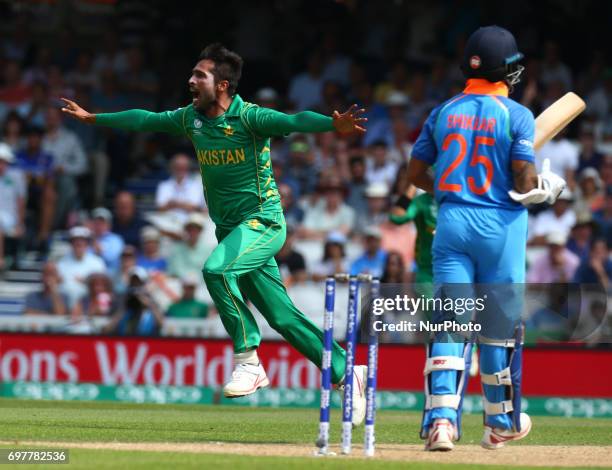 Muhammad Amir of Pakistan celebrate the wicket of Shikhar Dhawan of India during the ICC Champions Trophy Final match between India and Pakistan at...