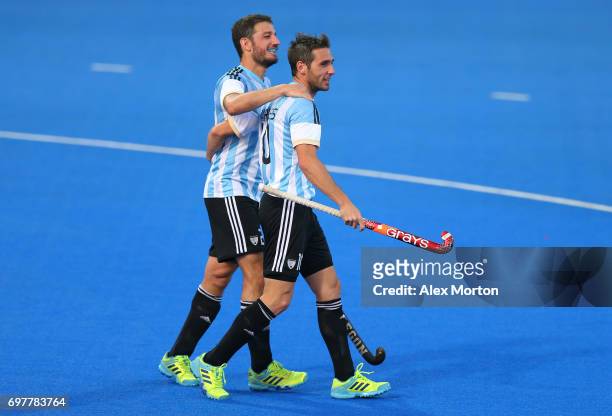 Matias Paredes of Argentina celebrates with teammates after scoring his team's fourth goal during the Pool A match between Argentina and China on day...
