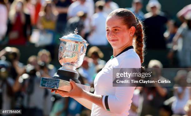 French Open Tennis Tournament - Day Fourteen. Jelena Ostapenko of Latvia with the trophy after her win against Simona Halep of Romania in the Women's...