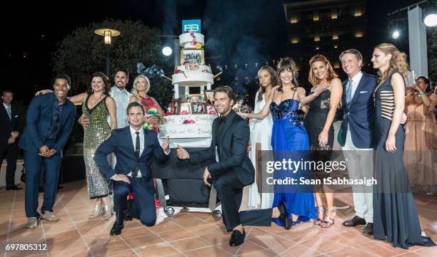 The Bold and the Beautiful cast pose on the dance floor with their 30th anniversary cake Rome Edwards, Heather Tom, Don Diamont, Katherine Kelly...
