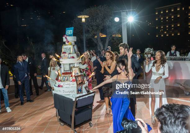 The Bold and the Beautiful cast pose on the dance floor for a photo celebrating the 'The Bold and The Beautiful' 30th Anniversary Party during the...