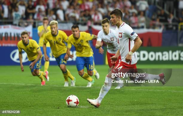 Dawid Kownacki of Poland scores his late penalty during the UEFA European Under-21 Championship Group A match between Poland and Sweden at Lublin...