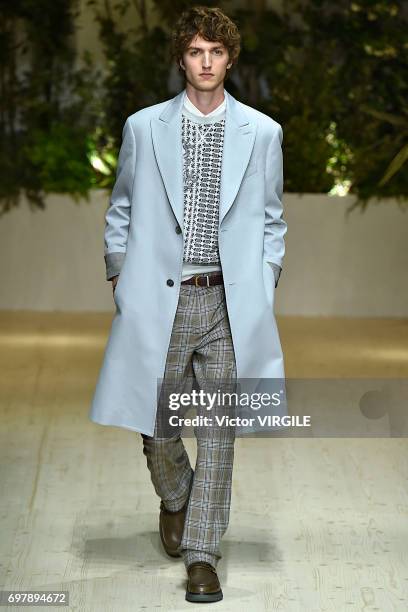 Model walks the runway at the Salvatore Ferragamo show during Milan Men's Fashion Week Spring/Summer 2018 on June 18, 2017 in Milan, Italy.