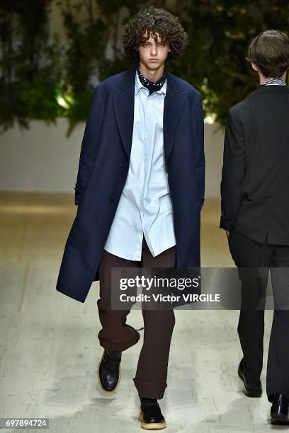 Model walks the runway at the Salvatore Ferragamo show during Milan Men's Fashion Week Spring/Summer 2018 on June 18, 2017 in Milan, Italy.