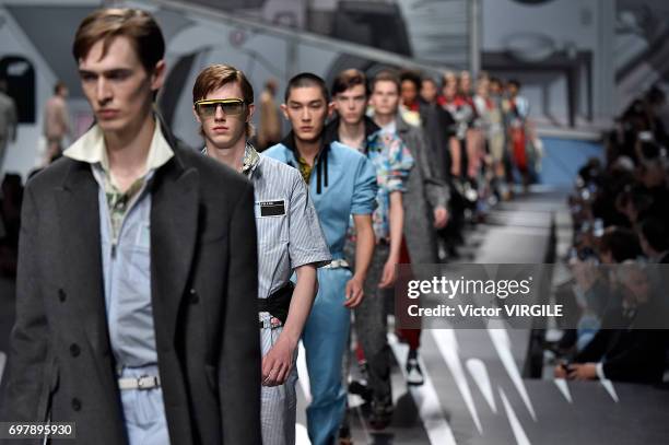 Model walks the runway at the Prada show during Milan Men's Fashion Week Spring/Summer 2018 on June 18, 2017 in Milan, Italy.