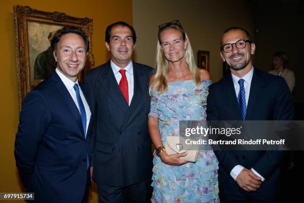 Stephane Bern, Prince Charles-Emmanuel de Bourbon-Parme, his wife Princess Constance de Bourbon-Parme and Lionel Bounoua attend the "Societe ses Amis...