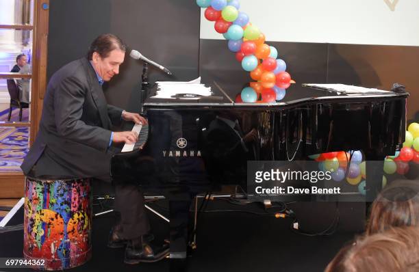Jools Holland performs at the inaugural fundraising dinner for The Petra Stunt Foundation in aid of PS Place at the Corinthia Hotel London on June...