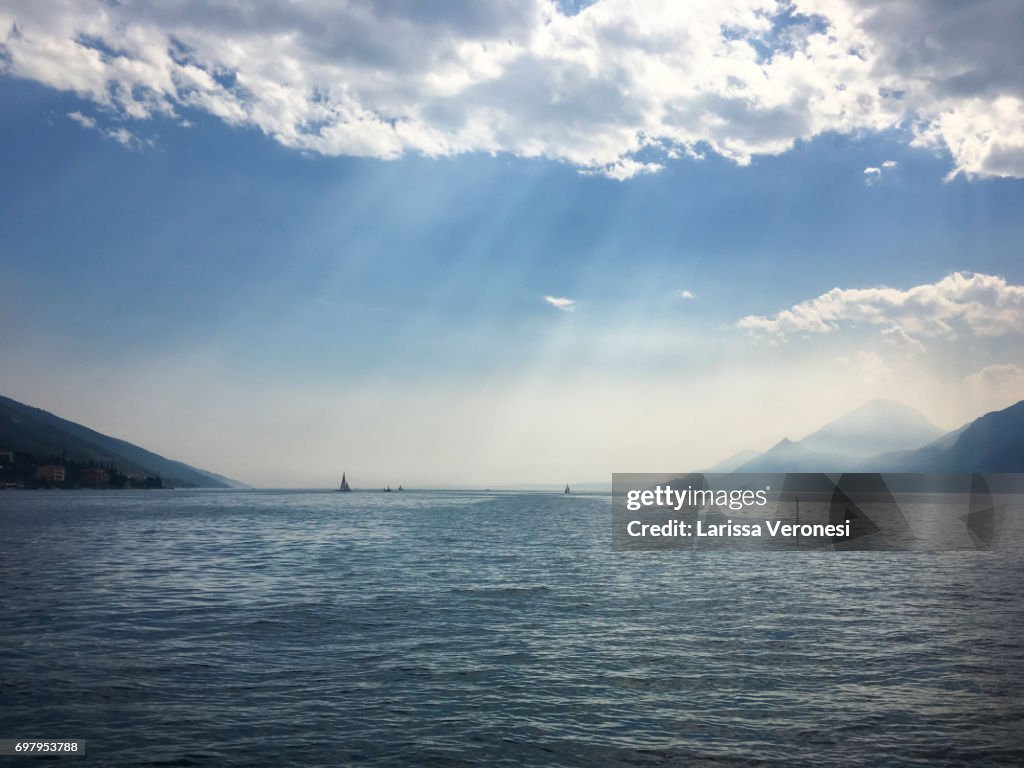 View of Lake Garda with sailboats, Italy