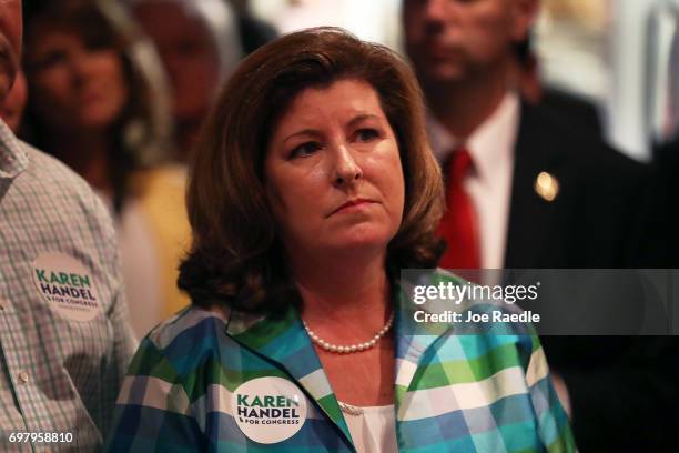 Republican candidate Karen Handel waits to be introduced to speak during a campaign stop at Houck's Grille as she runs for Georgia's 6th...