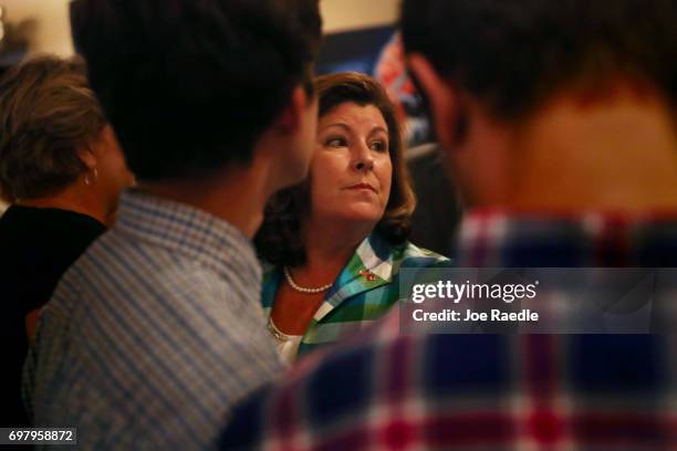 Republican candidate Karen Handel attends a campaign stop at Houck's Grille as she runs for Georgia's 6th Congressional District on June 19, 2017 in...