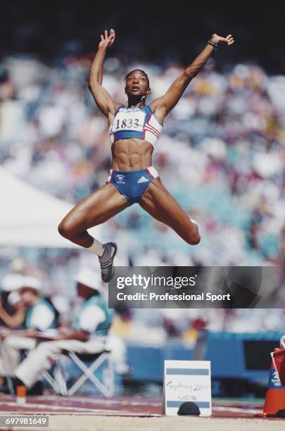 English heptathlete Denise Lewis pictured in action in the long jump discipline during competition to finish in first place to win the gold medal for...