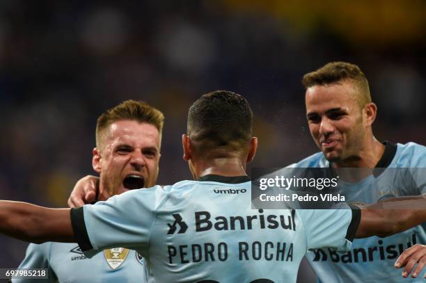 Ramiro, Pedro Rocha and Luan of Gremio celebrates a scored goal against Cruzeiro during a match between Cruzeiro and Gremio as part of Brasileirao...