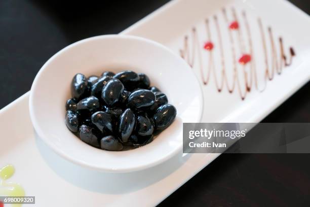 sweet black beans - black beans stock pictures, royalty-free photos & images