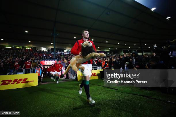 Peter O'Mahony leads the Lions out ahead of the match between the New Zealand Maori and the British & Irish Lions at Rotorua International Stadium on...