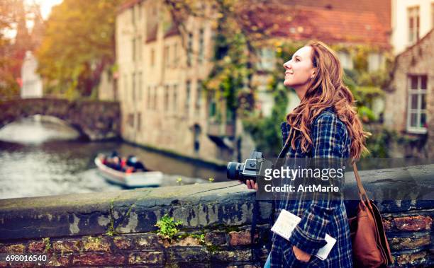 tourist in bruges - belgium stock pictures, royalty-free photos & images