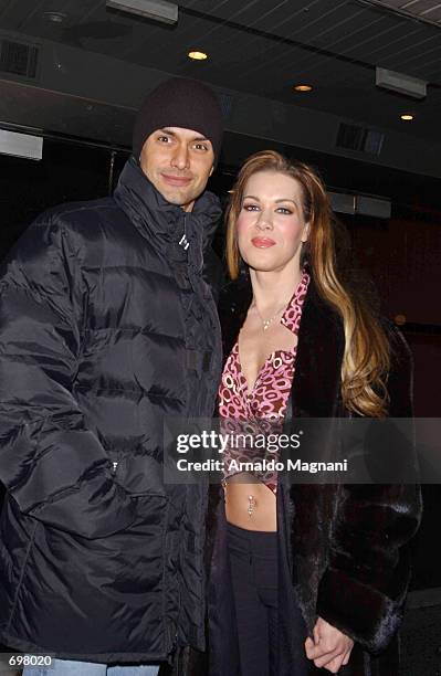 Model Marcus Schenkenberg and Joanie Laurer, the wrestler known as Chyna, leave a rehearsal at Roseland Ballroom February 4, 2002 in New York City.