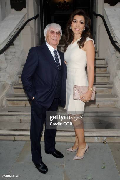 Bernie Ecclestone and Fabiana Flosi arriving at the Petra Stunt fundraiser at the Corinthia hotel on June 19, 2017 in London, England.