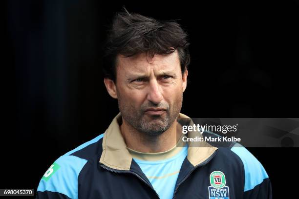 Blues coach Laurie Daley walks out onto the field during a New South Wales Blues State of Origin captain's run at ANZ Stadium on June 20, 2017 in...