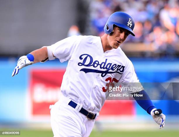 Cody Bellinger of the Los Angeles Dodgers celebrates his three run homerun to take a 4-0 lead over the New York Mets during the first inning at...