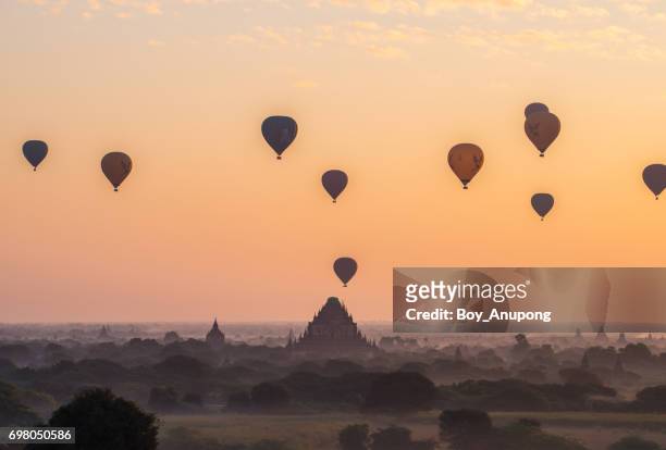 hot air balloons fly over damaged sulamani temple after 6.8 magnitude earthquake hit bagan (august 2016) - bagan temples damaged in myanmar earthquake stock pictures, royalty-free photos & images