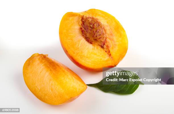 peach fruit - half complete stock pictures, royalty-free photos & images