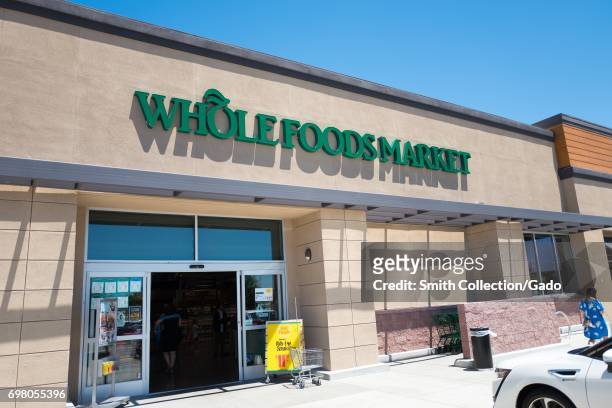 Logo and signage at the Whole Foods Market grocery store in Dublin, California, June 16, 2017. .