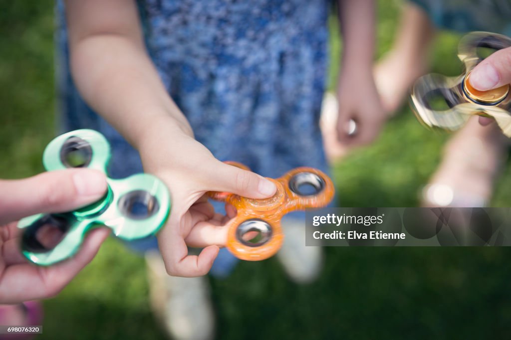 Group of children with fidget spinners