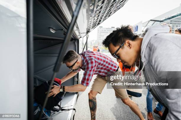 Bus Loading Man 675 Bus Loading Stock Photos, High-Res Pictures, and Images - Getty Images