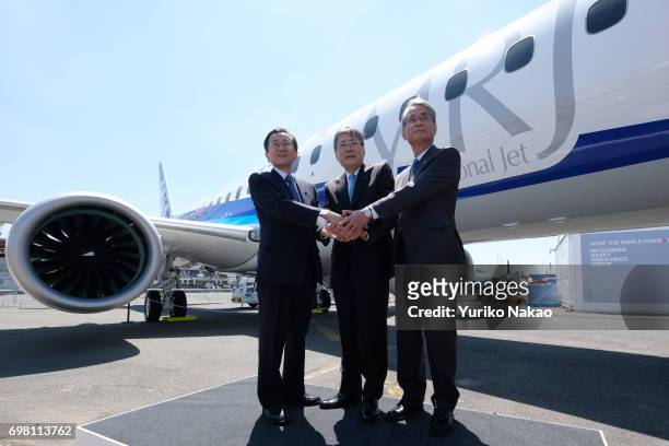 Hisakazu Mizutani , Mitsubishi Aircraft Corporation's president, Shunichi Miyanaga , Mitsubishi Heavy Industries' President and Chief Executive...
