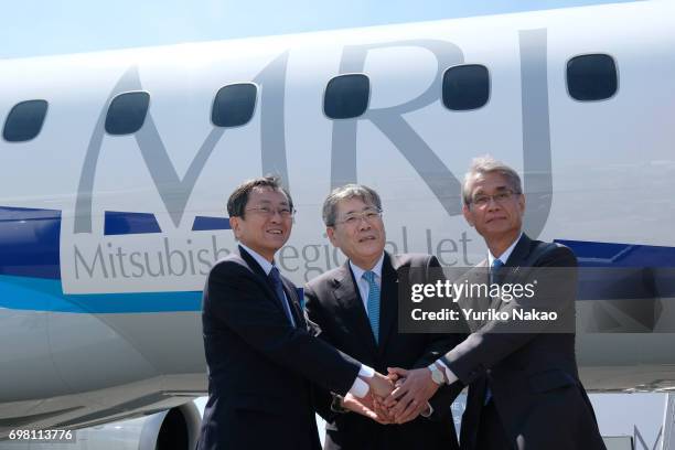 Hisakazu Mizutani , Mitsubishi Aircraft Corporation's president, Shunichi Miyanaga , Mitsubishi Heavy Industries' President and Chief Executive...