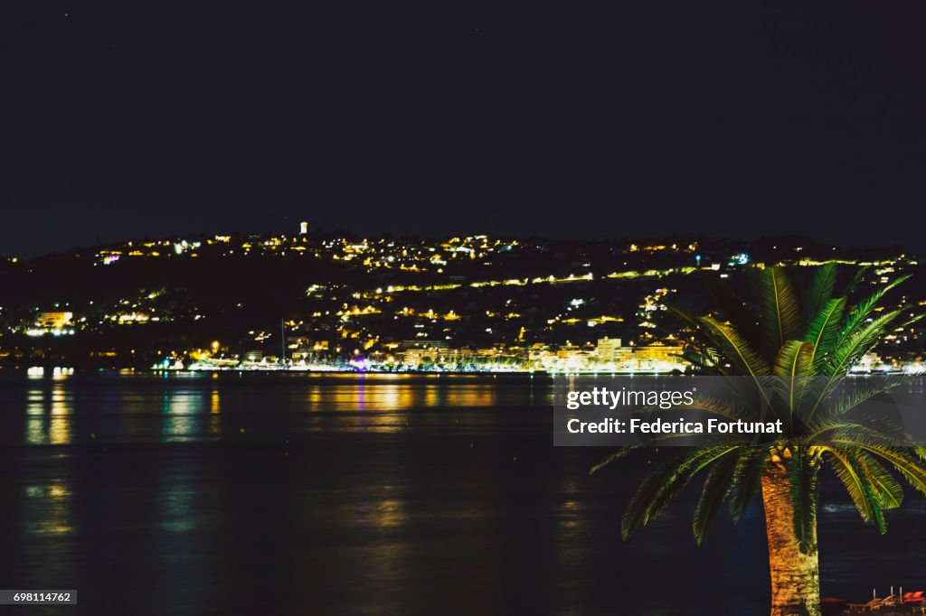 Night view of the Mediterranean sea and French Riviera coastline