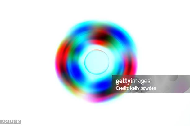 led fidget spinner abstract background - fidget spinner stock-fotos und bilder