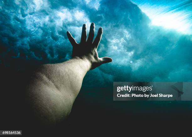 wave reach - drowning stock pictures, royalty-free photos & images