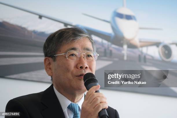 Shunichi Miyanaga, Mitsubishi Heavy Industries' President and Chief Executive Officer, attend a news conference for their Mitsubishi Regional Jet at...