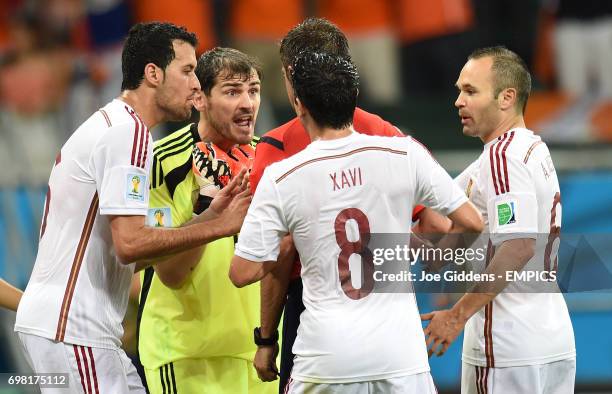 Spain goalkeeper Iker Casillas appeals to referee Nicola Rizzoli after Netherland's' Stefan de Vrij scores his side's third goal