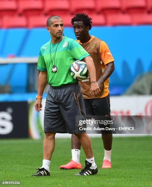 Ivory Coast's coach Sabri Lamouchi with Wilfried Bony