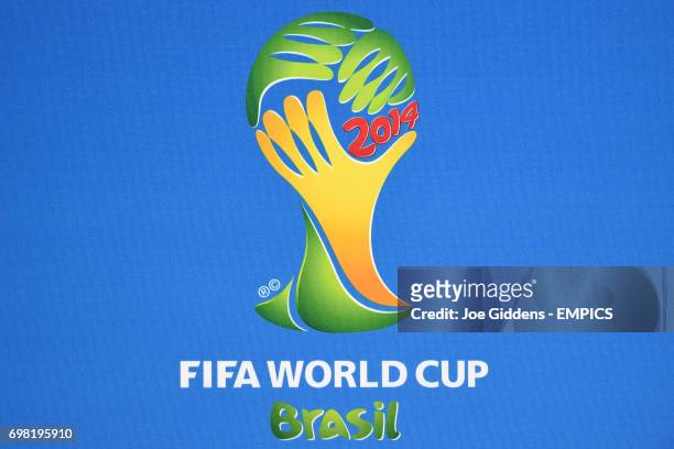 Official FIFA World Cup 2014 logo on an advertising board during a press conference at Arena das Dunas in Natal