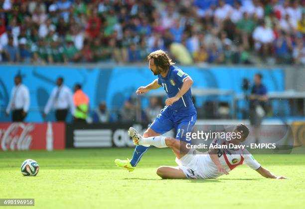 Italy's Andrea Pirlo and Costa Rica's Jose Cubero battle for the ball
