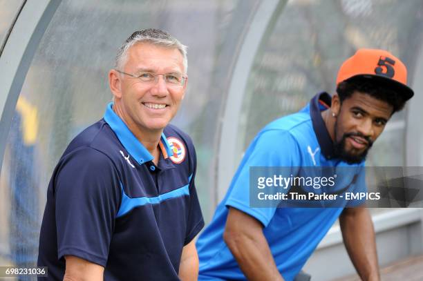 Reading manager Nigel Adkins on the bench with Garath McCleary