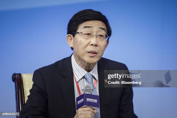 Wang Yongsheng, executive vice president of China Development Bank Corp., speaks during the Lujiazui Forum in Shanghai, China, on Tuesday, June 20,...