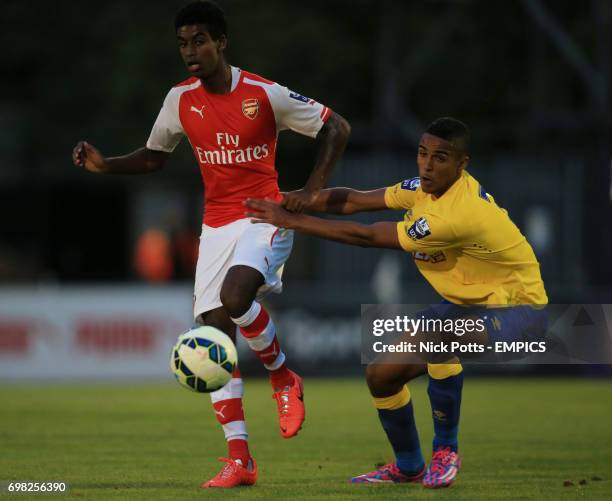 Arsenal's Gedion Zelalem holds off challenge from Derby County's Alefe Santos