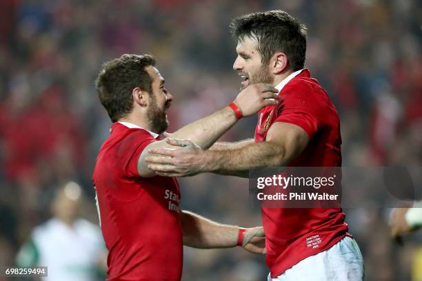 Jared Payne of the Lions is congratulated on his try by Robbie Henshaw during the match between the Chiefs and the British & Irish Lions at Waikato...