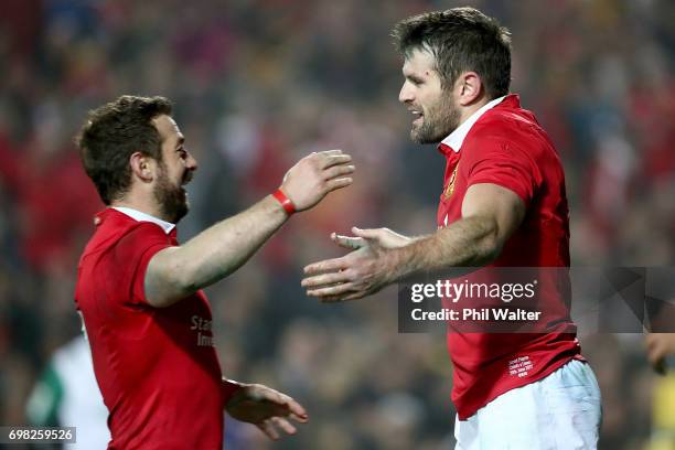 Jared Payne of the Lions is congratulated on his try by Robbie Henshaw during the match between the Chiefs and the British & Irish Lions at Waikato...
