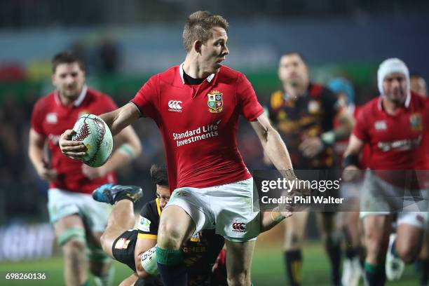 Liam Williams of the Lions is tackled during the match between the Chiefs and the British & Irish Lions at Waikato Stadium on June 20, 2017 in...