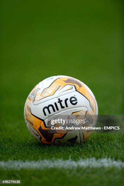 General view of an Official Mitre Football League match ball on the grass