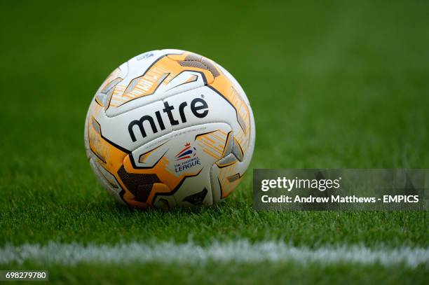 General view of an Official Mitre Football League match ball on the grass